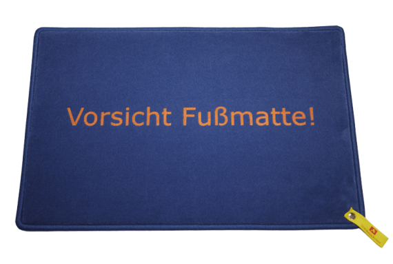 Fußmatte: Vorsicht_Fussmatte_Dreckstueckchen